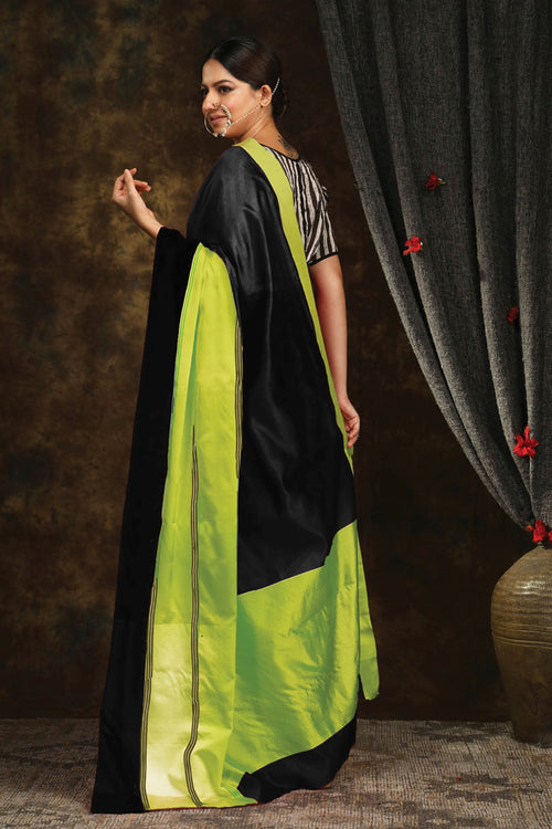 Black and green silk mushru saree