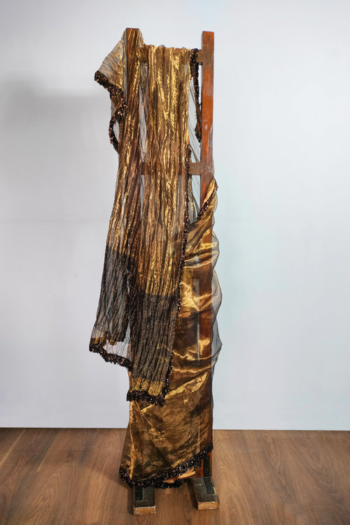 Gold tissue crushed saree with Jhalar/fringe
