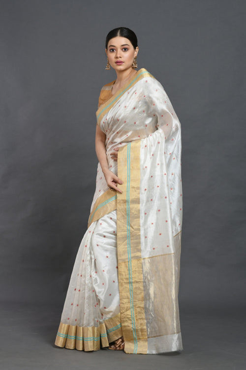 White silk saree with red buties