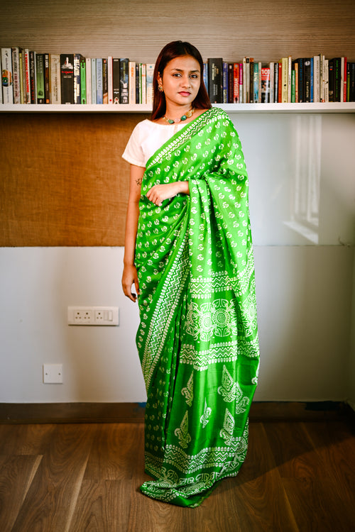 Elegantly Draped Dark Green printed silk handwoven sari