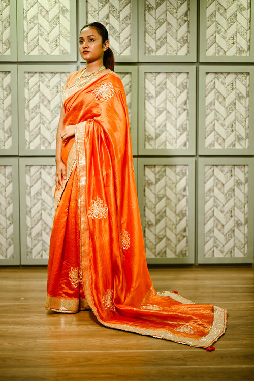 Orange silk handwoven sari with hand sequence work