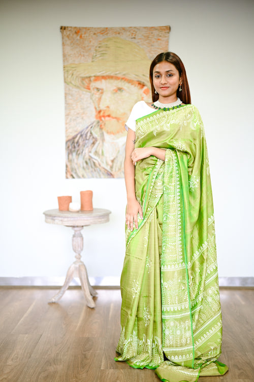 Light Green Silk Handwoven Sari With Intricate White Design Worn By The Modal