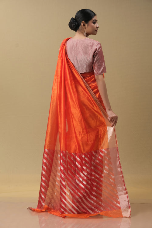 Orange silk sari with red pallu