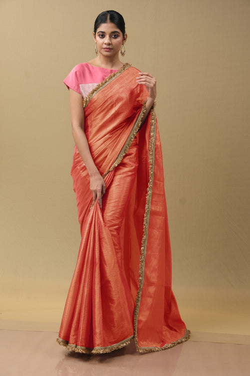 Orange Tissue Saree with Golden Phuljhari Border – Festive Wear