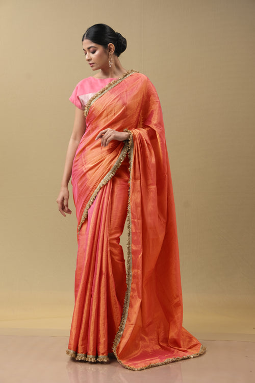 Orange Tissue Saree with Golden Phuljhari Border – Festive Wear