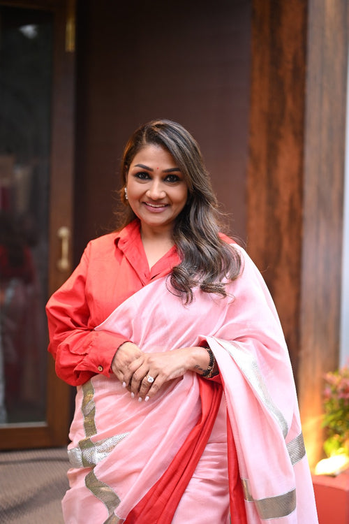 Dolly Jain peach sari with red mushru border with gota lines