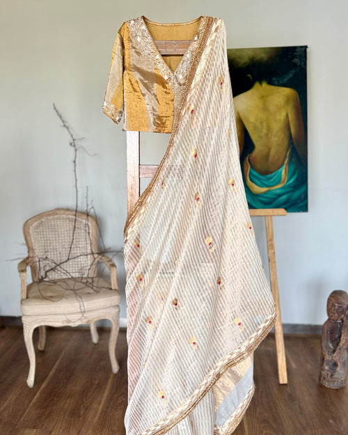White and gold silk sari