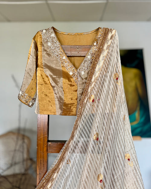 White and gold silk sari