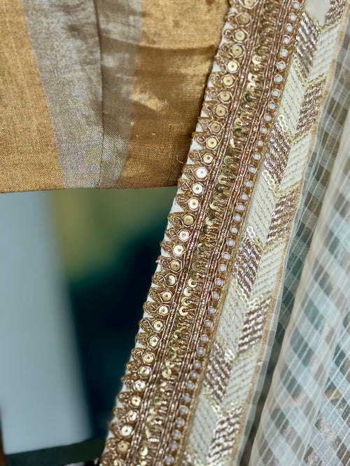 White and gold silk sari