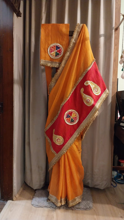 Truly festive saree in Orange and red